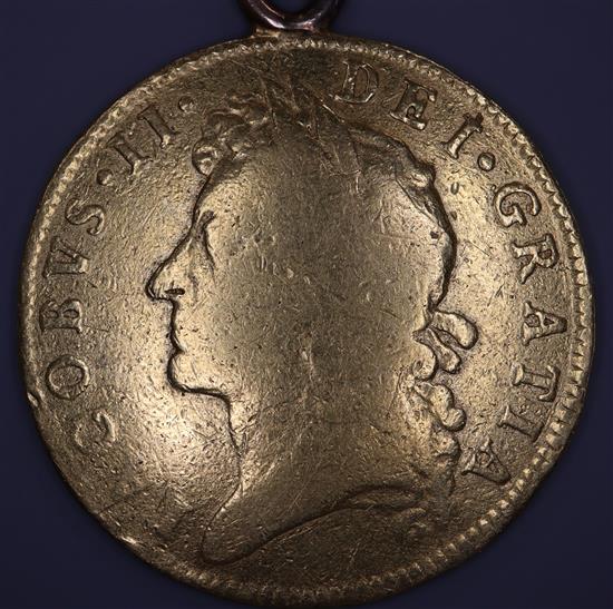 A James II 1685 gold guinea (worn and with pendant mount).